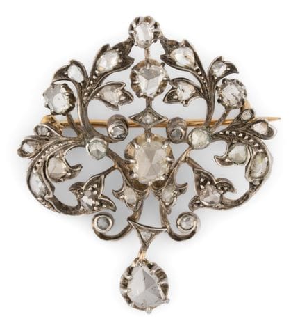 Brooch   19th century. 750 gold and silver. Set wi