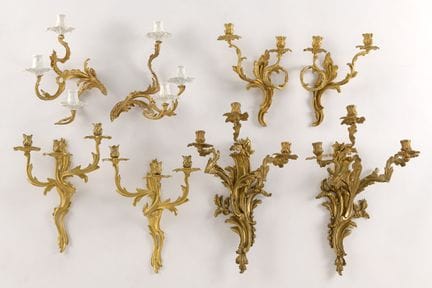 Quatre paires d'appliques de style Louis XV Bronze
