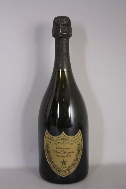 1 B "DOM PERIGNON" BRUT CHAMPAGNE (a few tears in 