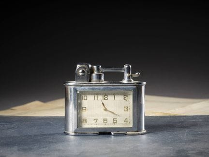 TABLE CLOCK-LIGHTER GIVEN TO JEAN MERMOZ BY HIS CO