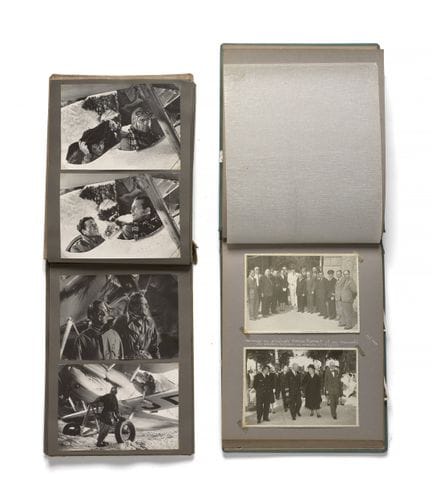 TWO PHOTO ALBUMS

- The first contains a collectio