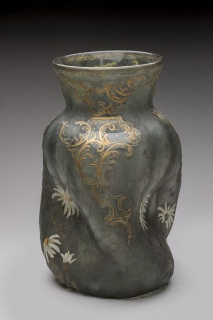 LEGRAS.
Curved green glass vase with a frosted bas