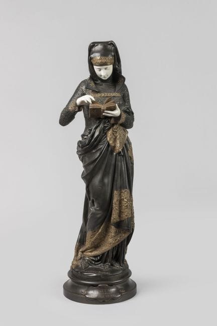 欧内斯特·卡里耶-贝勒斯（1827-1884）
《读书的女子》
青铜与象牙材质，表面施以多种褐色及金