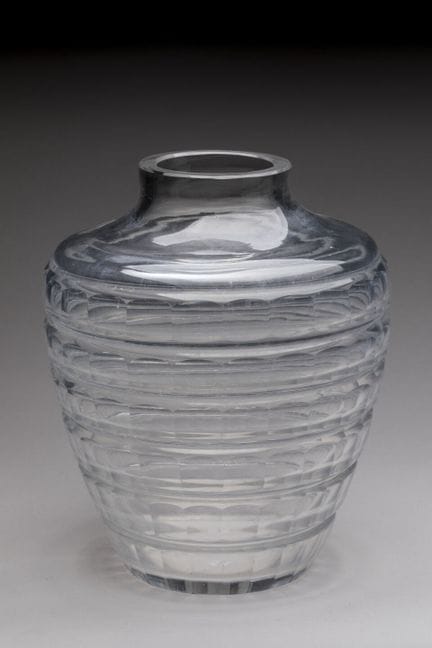 1930s
A rounded vase made of clear glass, entirely