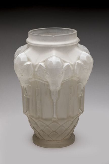 Etling
A rounded vase made of pressed molded glass