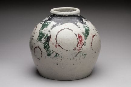 Betzy Augeron
Beige ceramic vase with a floral gla