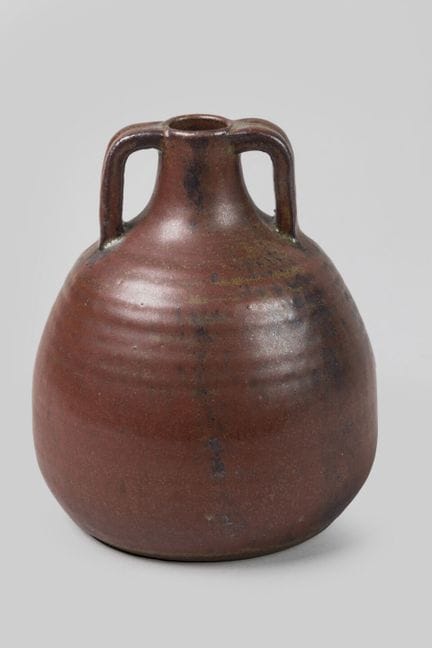 Taizé
A rounded vase with a narrow neck and two ha