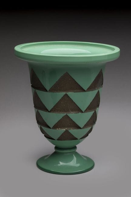 Open-top vase on a green glass pedestal, engraved 