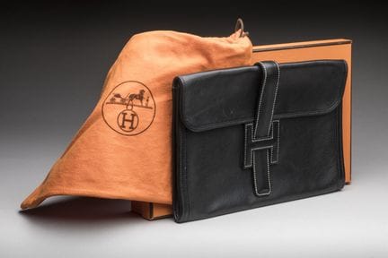 HERMES. Schwarze Box-Leder-Clutch, Innenfutter aus