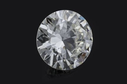 RING aus 750er Gelbgold mit einem Diamanten im Bri