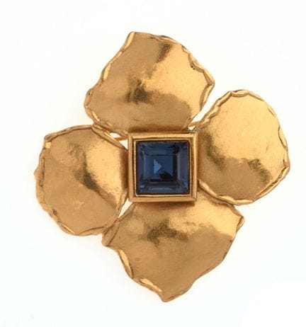 YVES SAINT-LAURENT - PENDENTIF broche en métal dor