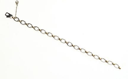 CARTIER Bracelet gourmette "Santos" en or jaune 18