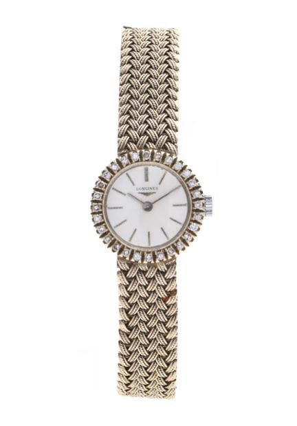 LONGINES - MONTRE de dame en or gris 750 °/°°, boi