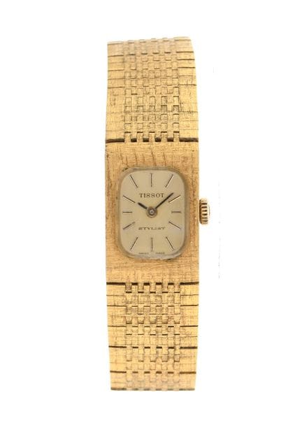 TISSOT - MONTRE de dame en plaqué or. Poids brut :