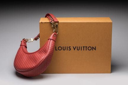 Louis VUITTON - Sac "Loop en cuir rouge et cuir ro