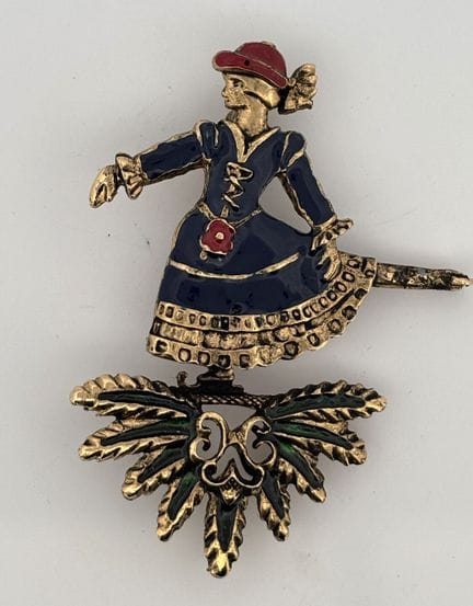 HERMÈS - BROCHE en métal doré et émaillé polychrom