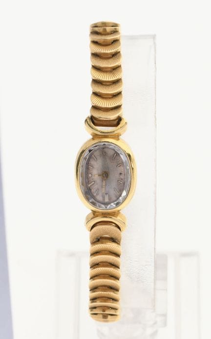 MONTRE bracelet de dame en or jaune 750 °/°°, boit