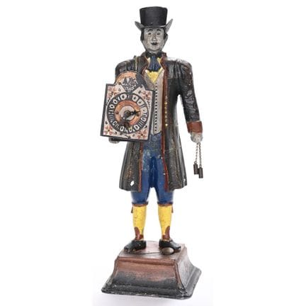 FIGURA de hierro fundido pintada sobre un pedestal