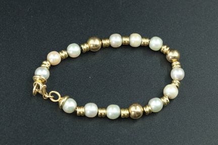 Armband aus 18 Karat Gelbgold (750°/00) mit abwech