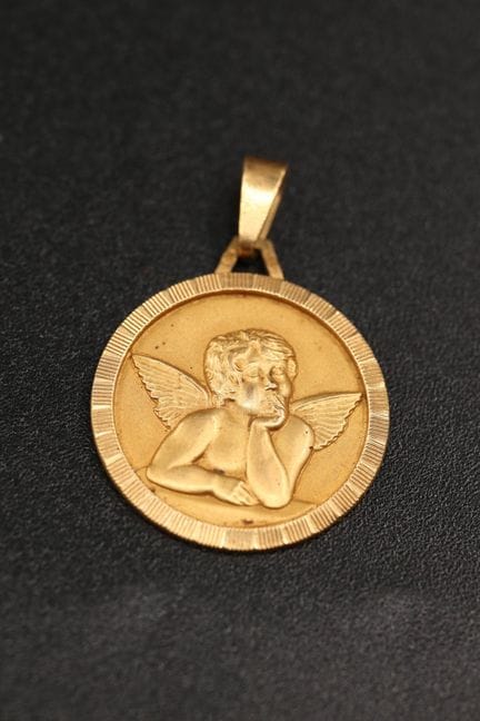 Medaille aus 18 Karat Gelbgold (750°/00) mit einem