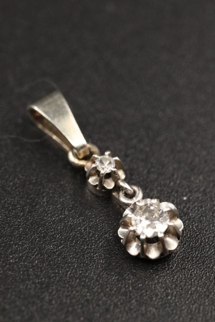 Anhänger aus 18 Karat Weißgold (750°/00) und Plati