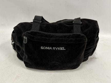 SONIA RYKIEL - Sac polochon en velours noir. (usur