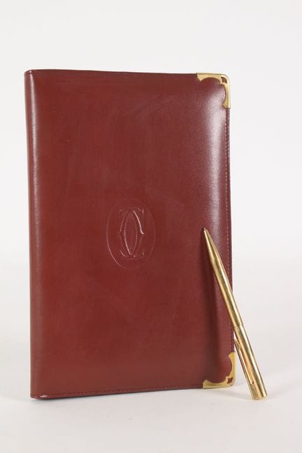 CARTIER - Porte bloc-notes en cuir bordeaux, les p