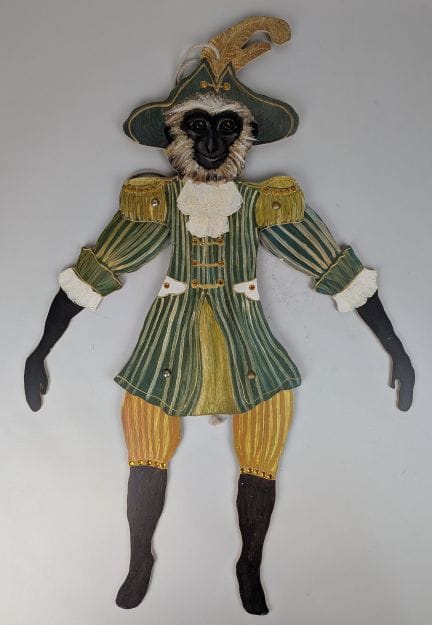 Gelenkige Marionette in Form eines Affen, gekleide