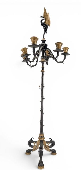 Curiosa CANDELABRO
De bronce con pátina negra y do