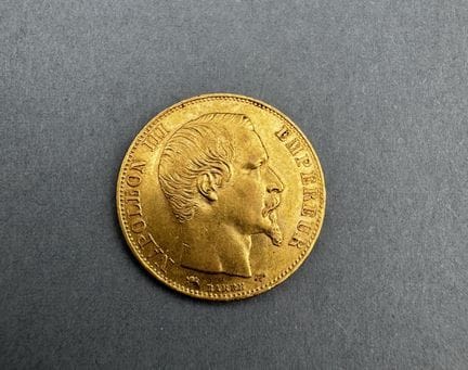 20 francos de oro de Napoleón III con la cabeza de