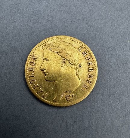 20 F con la efigie de Napoleón con corona de laure