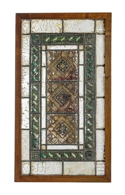 White, green, and red glass on a metal frame. 75 x