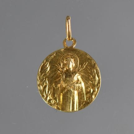 PENDENTIF médaillon en or ornée d'un saint personn