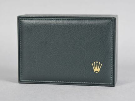 ROLEX
Coffret de montre en simili-cuir vert.
(Peti