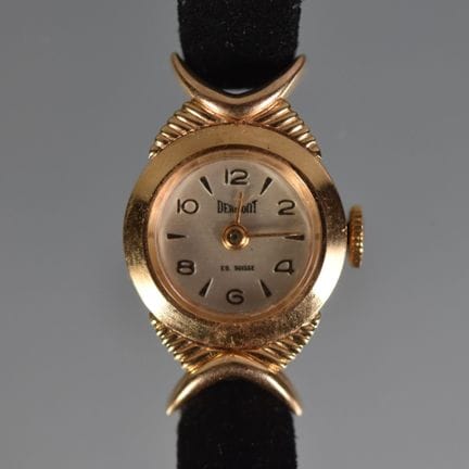 DERMONT 
Women's wristwatch with a yellow gold cas