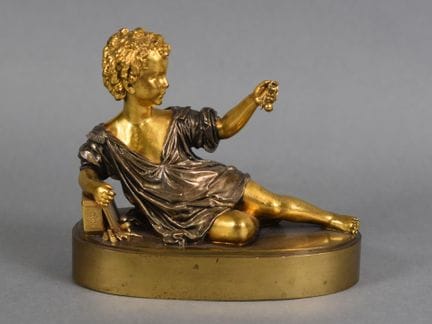 FIGURA de bronce dorado y plateado que representa 