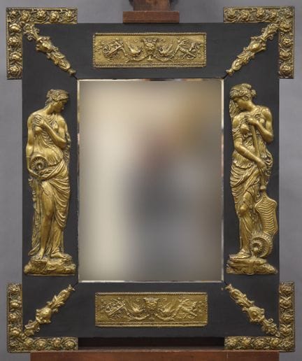 SPECCHIO rettangolare in legno annerito. Decorazio