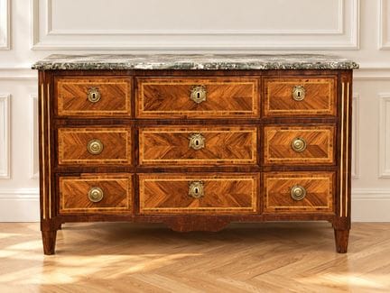 Commode cinq tiroirs  sur 3 rangs en placage de bo