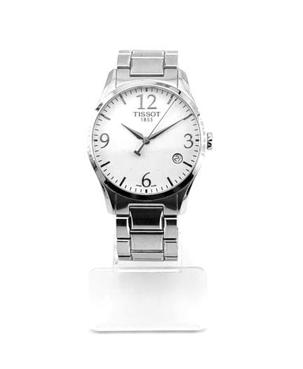 TISSOT
Montre en acier, fond blanc, guichet de dat