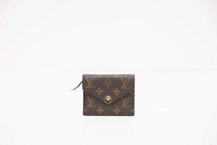 LOUIS VUITTON
Portefeuille/porte-monnaie en toile 