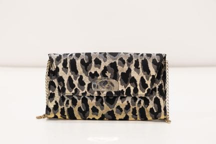 LOUBOUTIN
Sac bandoulière en tissu métallisé, doub