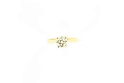 Yellow gold ring set with a 0.90 ct. solitaire dia