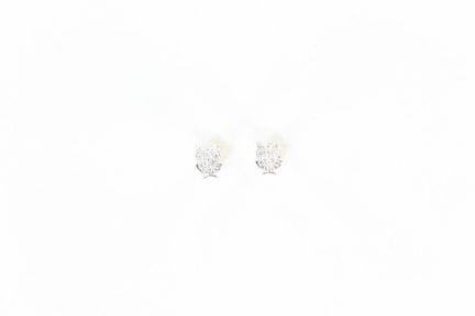 A pair of 18K gold earrings featuring owls, each s