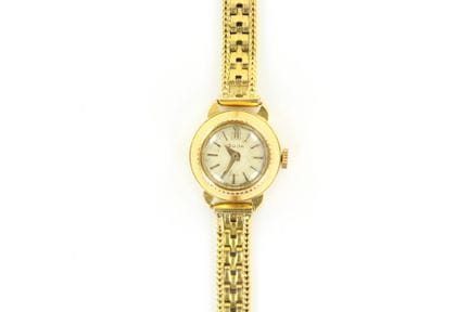 Suja. Montre dame avec boitier et bracelet en or j