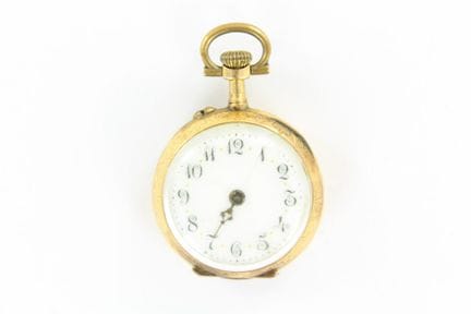 Collar watch with an 18K yellow gold case. The bac