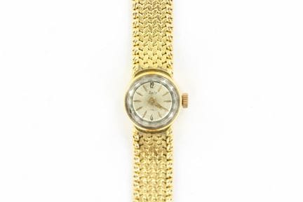 Spir. Women's watch with an 18K yellow gold case a