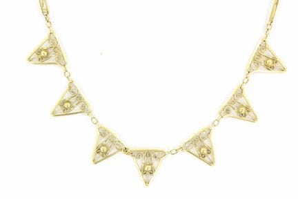 18K yellow gold ruff necklace. Length: 45
8.8 g
