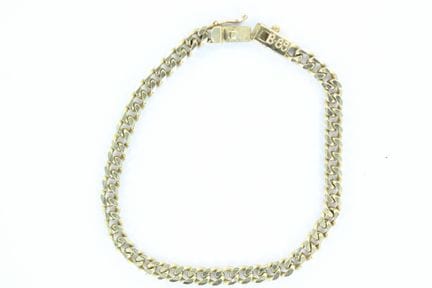 14K gold flat-link bracelet. Length: 21
16.8 g