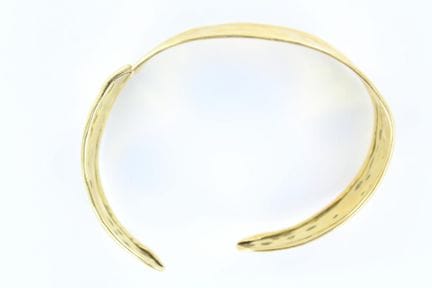 Bracelet rigide en or jaune 18 K nombreux chocs et