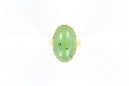 18K yellow gold ring featuring a central green cab